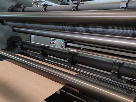 Unidade de adesão transversal